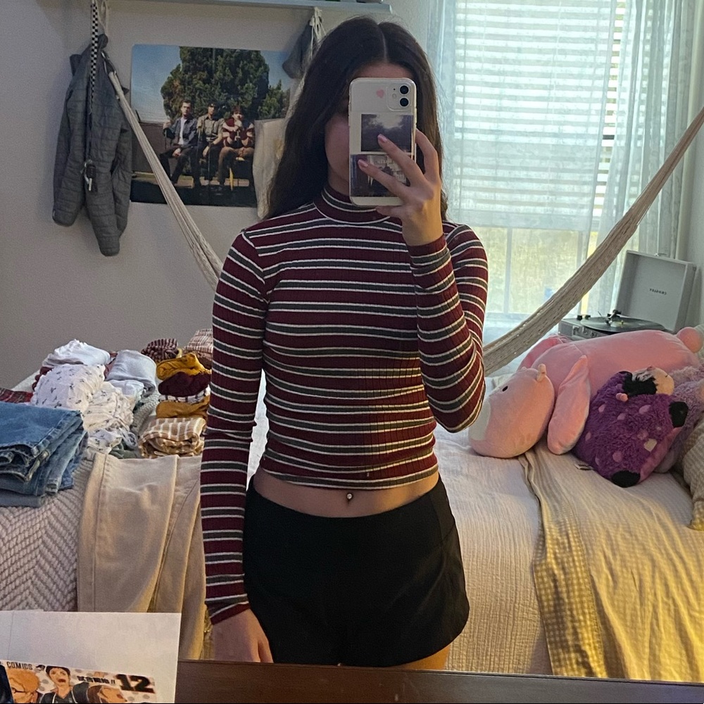 red green and white striped long sleeve shirt